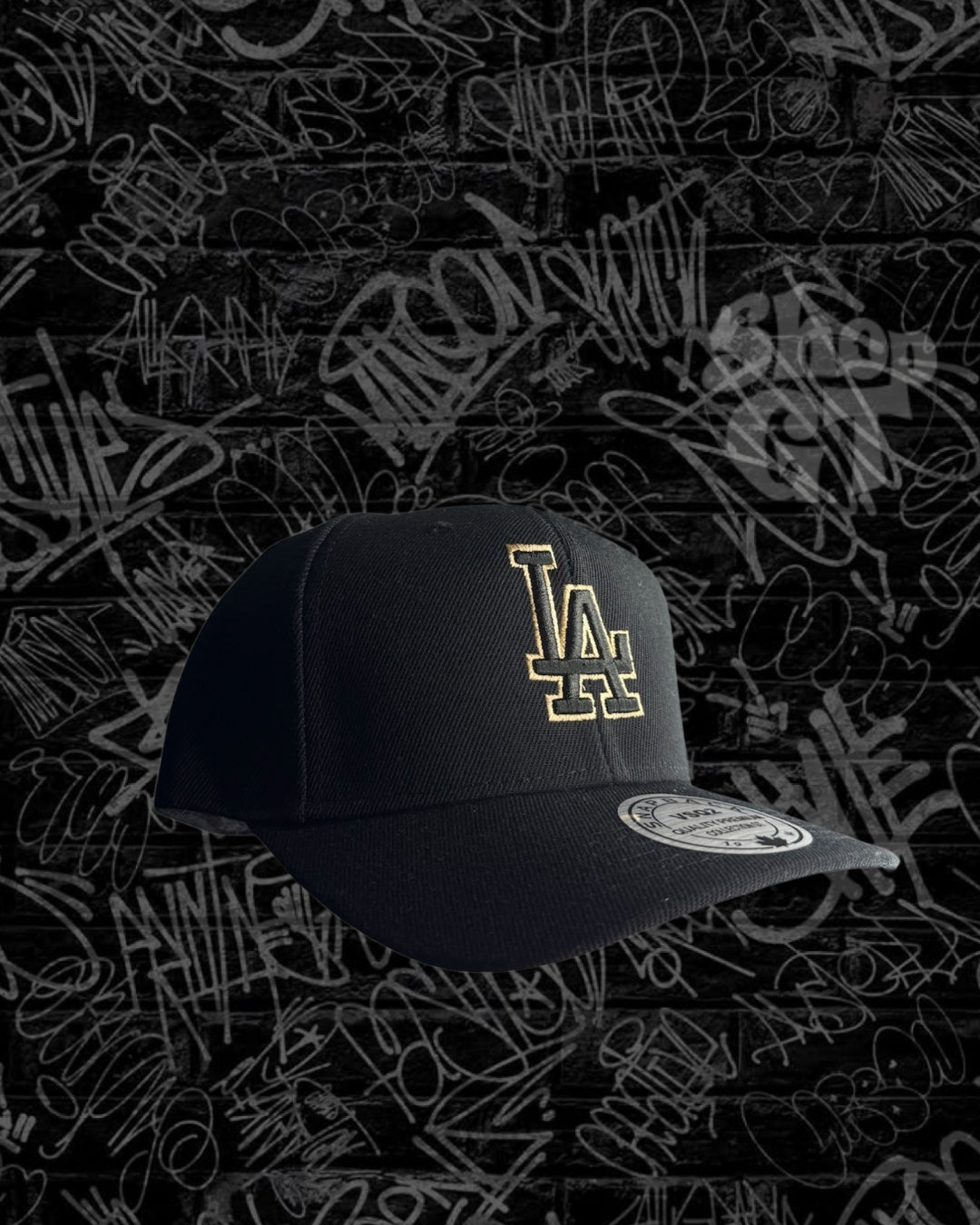 Gorra Curva LA negro y dorado